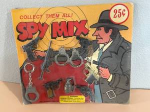 lot 25 image: Vintage Spy Mix KC Toy