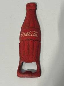 lot 41 image: Cast Iron Coke Bottle Opener 5 12