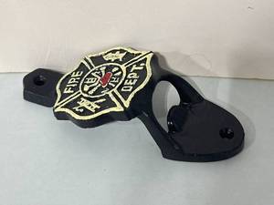lot 61 image: Metal Fire Dept. Bottle Opener