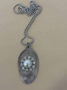 lot 45 image: Unique Necklace (metal appears to be silver)
