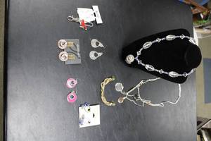 lot 299 image: Assorted Jewelry Lot Necklaces, Earrings, Bracelet, and Key Purse Holder