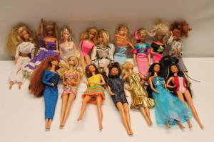 lot 315 image: Collection of 17 Mattel Barbie Dolls with Assorted Clothing