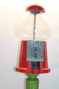 lot A-336 image: Vintage Gumball Machine on Ornate Green Stand