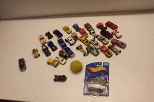 lot 406 image: Assorted Hot Wheels and Matchbox Toy Cars Collection with Vintage Tennis Ball