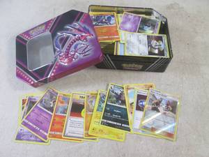 (EC1) Assorted Pokemon Cards in Met...