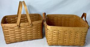lot 28 image: Longaberger 1994 Large 16 Basket with Swing Handles and 2000 Large 15.75 Newspaper Basket with Leather Handles