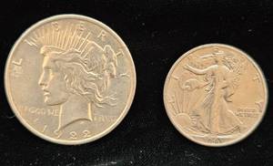 lot 102 image: Peace 1922 Silver Dollar and 1943 Walking Liberty Half Dollar