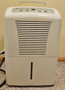 lot 99 image: GE 65 pint 24 Hour Dehumidifier