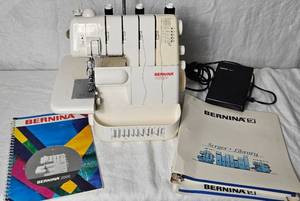 lot 81 image: Bernina 2000DE Serger Sewing Machine with Foot Pedal and Serger Library