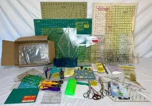 lot 97 image: Quilters Suppies - Cutting Mats, Rulers, Scissors, Paper Pieces, Rotary Cutters and More