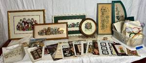 lot 123 image: Counted Cross Stitch Bundle - Patterns, Floss, Fabric, and Finished Projects