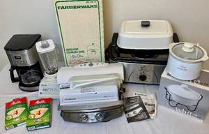 lot 63 image: Small Appliance Bundle - Calphalon Removable Plate Grill, Cuisinart Coffe Maker, Osterizer Blender, Crock Pot, Rival 20 qt Roaster Oven, Foodsaver, Farberware Coffe Urn