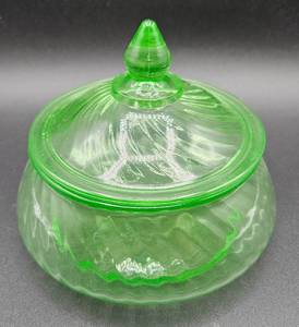 lot 24 image: Vintage Uranium Glass Hocking Glass Ribbed Jar with Lid