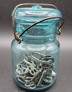 lot 69 image: Vintage Blue Ball Ideal Mason Jar with Wire Bale Lid and 33 Skeleton Keys plus 5 Flat Keys