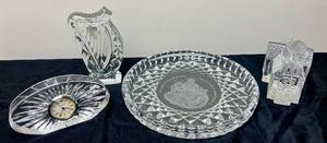 lot 70 image: Waterford Crystal Collection- Crystal Harp Paperweight, Lismore Village Church Paperweight, Christmas Plate and Crystal Oval Clock