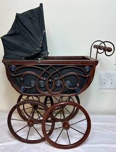lot 107 image: Vintage Doll Buggy with Wicker & Iron Accents