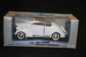 lot 1608 image: Welly 1936 Ford Deluxe Cabriolet Diecast Metal Collectible 118 Scale (in original box)
