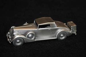 lot 1640 image: Danbury Mint 1937 Packard Coupe Pewter Collectible 5-12