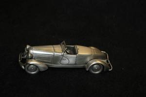 lot 1643 image: Danbury Mint 1933 Dusenberg Boattail SJ Pewter Collectible 5