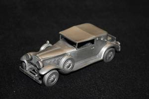 lot 1646 image: Danbury Mint 1930 Packard Convertible Pewter Collectible 5-12