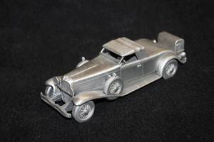lot 1658 image: Danbury Mint 1934 Dusenberg SJ Pewter Collectible 7-12