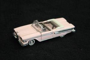 lot 1661 image: 1953 Packard Caribbean Diecast Metal Collectible 143 Scale