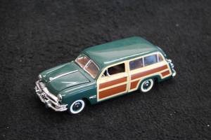 lot 1663 image: 1950 Ford Woody Wagon Diecast Metal Collectible 143 Scale
