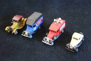 lot 1677 image: Lot of (4) Diecast Metal Collectible Cars - Atlas Tire Delivery Truck, Standard Oil Announcer Van, 1913 Cadillac, 1932 Ford 5-window Coupe