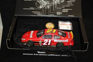 lot 1701 image: Team Caliber Wood Brothers #21 Ricky Rudd Motorcraft 2004 Ford Taurus Owners Series Limited Edition Diecast Metal Replica 124 Scale (in original box)
