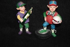 lot 1728 image: Lot of (2) Race Car Driver theme Elves