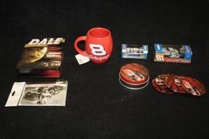 lot 1742 image: Lot of (6) #3 Dale Earnhardt and #8 Dale Jr. Collectibles - (6) DVDs, (1) Coffee Mug, (1) Note Cards Pack, (1) Jr. Matchbox Car, (1) 143 Car, Set of Coasters