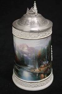 lot 1807 image: Longton Crown Thomas Kinkade Woodland Retreat Collection Limited Edition First Issue 1996 A Quiet Evening at Riverlodge #C6190 Collectors Beer Stein 7-12 with Certificate of Authenticity