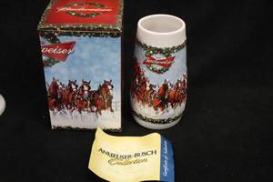 lot 1802 image: Brax Limited Anheuser-Busch Collection 2009 Budweiser A Holiday Tradition Collectors Beer Tankard CS699 with Collectors Tin, Certificate of Authenticity