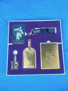 lot 169 image: Elton John Farewell Yellow Brick Road Final World Tour VIP Package Keychain, Luggage Tag, Lanyard, Etc.