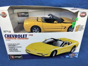 lot 171 image: BURAGO METAL MODEL CAR KIT 124 SCALE YELLOW CONVERTIBLE CHEVROLET CORVETTE