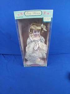 lot 202 image: Vintage Early Blossom Collection Genuine Porcelain Doll 16 with Stand