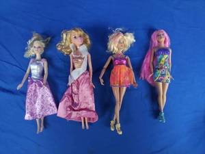 lot 208 image: Collection of Four Collectible Mattel Barbie Dolls