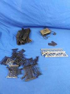 lot 232 image: Vintage TYCO HO Scale Tracks, Bridge Parts, and Transformer