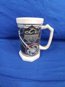 lot 249 image: OCC 2005 Orange County Choppers New York 32oz Mug Stein