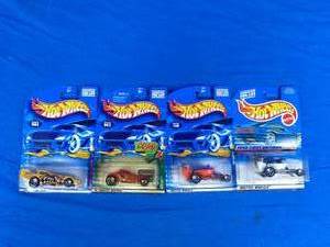 lot 279 image: Lot of 4 Mattel Hot Wheels Cars Hot Seat, Sooo Fast, and Others