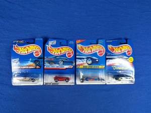 lot 280 image: Lot of 4 Mattel Hot Wheels Cars Dodge Viper, Cat-a-Pult, Etc.
