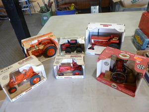 5 Ertl Case and Farmall Die-Cast Tractors