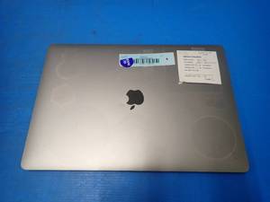 lot 39 image: Apple&nbspA1990 MacBook Pro 15,1 &nbspINTEL CORE I7-8850H 2.6 Ghz  32GB DDR4 SDRAM  500GB Integrated HD  15.4 screen with 2880 x 1800 HD Resolution  Includes IOS  No Charger &nbspkey(s) fading  minor keymarks on screen