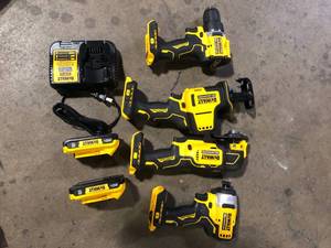 DEWALT ATOMIC 20-Volt Lithium-Ion Cordless Brushless Combo Kit (4-Tool) with (2) 2.0Ah Batteries, Charger and Bag   Customer Returns See Pictures