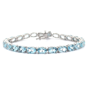 15 Carats Oval Blue Topaz Tennis Bracelet