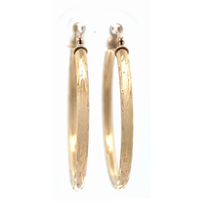 Textured Diamond-Cut Round Hollow Hoop Earrings in Yellow Gold