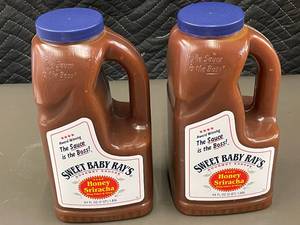 lot 272 image: Sweet Baby Rays Honey Sriracha Wing Sauce & Glaze (2-Pack, 64 fl oz Each)