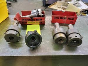 lot 125 image: Bridgeport boring head and (4) hold...