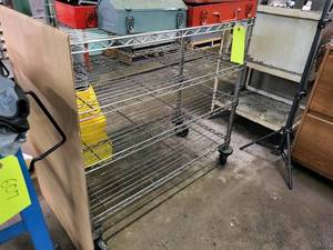 lot 144 image: Wire shelf on casters...