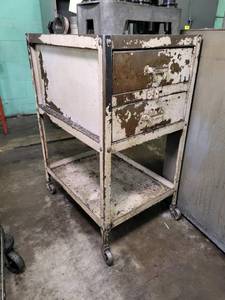 lot 145 image: 2-drawer metal cabinet on rollers...